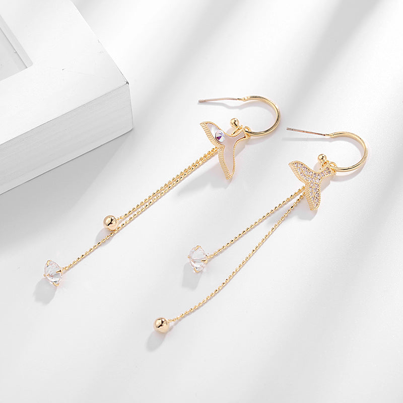 whale steak wave asymmetric earrings whale steak wave asymmetric earrings