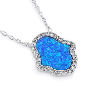 sterling silver clear cz and blue opal hamsa necklace